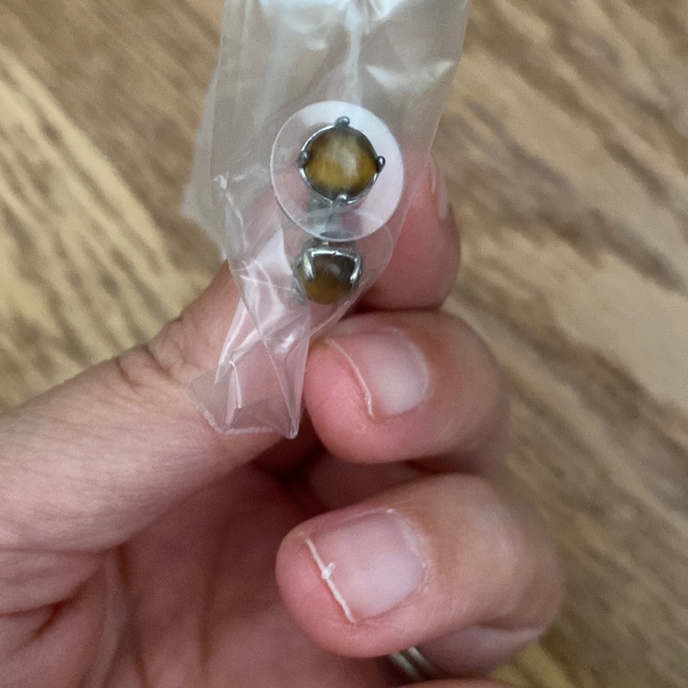 Three pairs of stud earrings